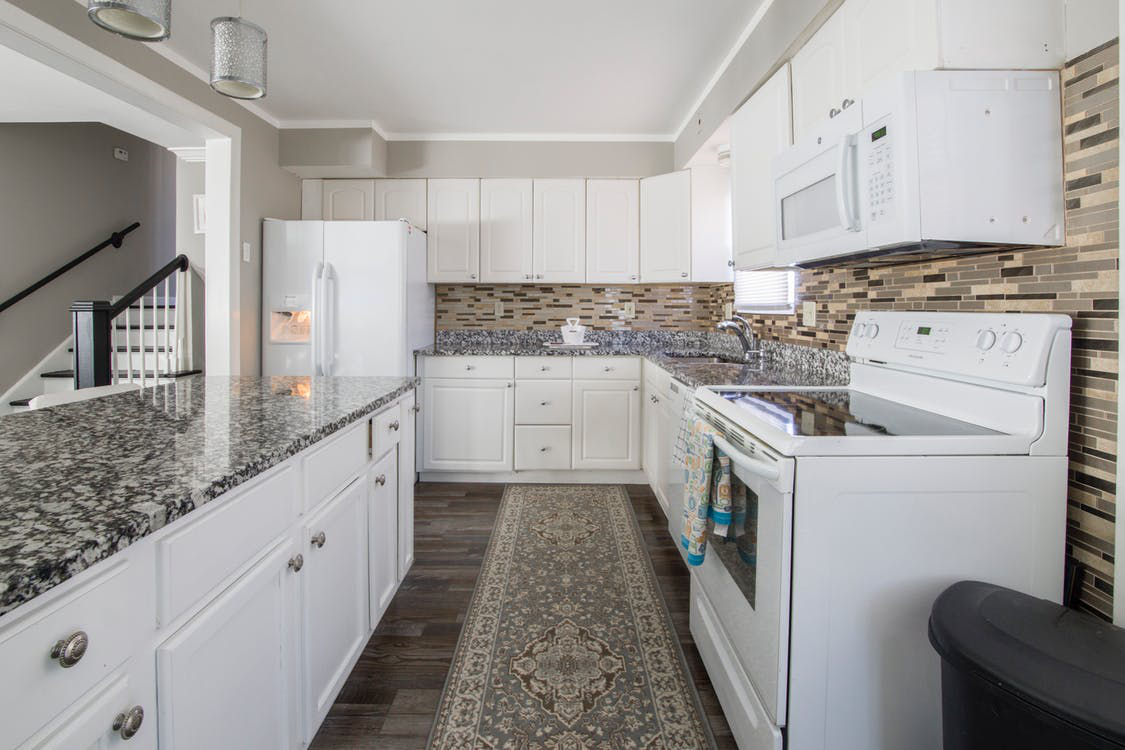 How to Update the Tired Look of Your Kitchen Cabinet Doors